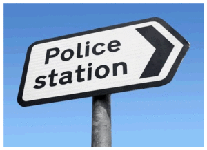police station direction sign